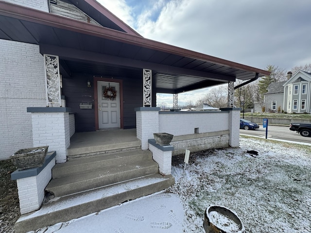 property entrance with a porch