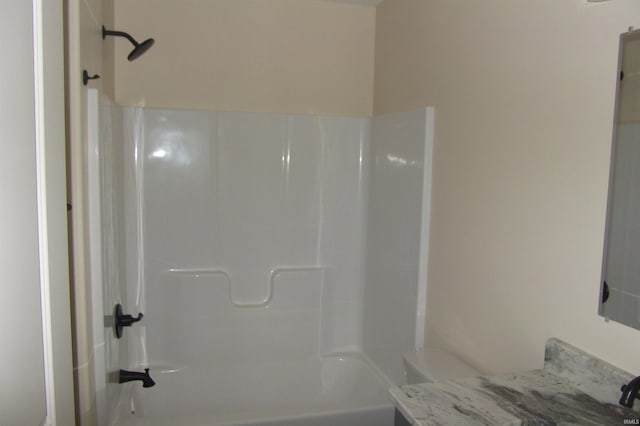 full bathroom featuring shower / tub combination, vanity, and toilet