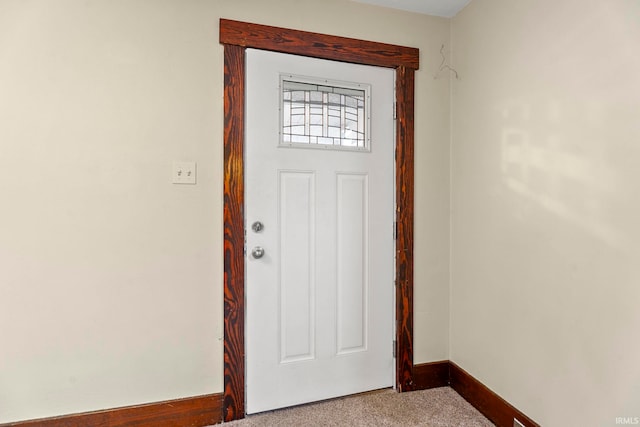 entrance foyer with carpet