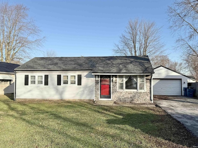 ranch-style home with a garage and a front yard