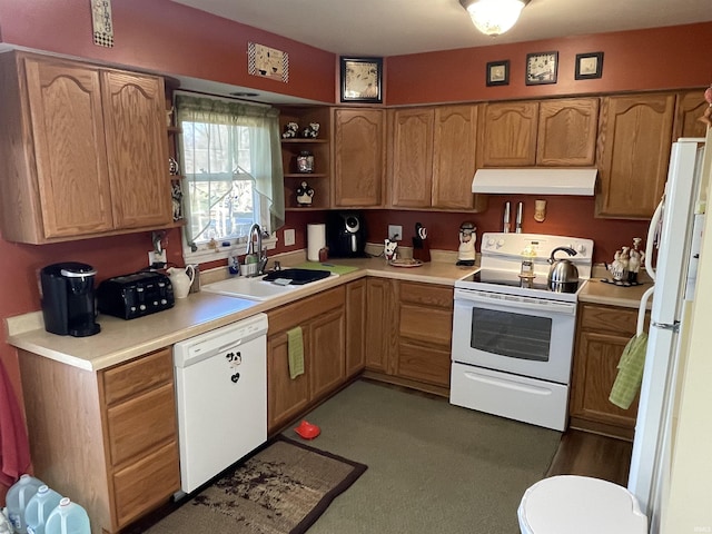 kitchen featuring white appliances and sink