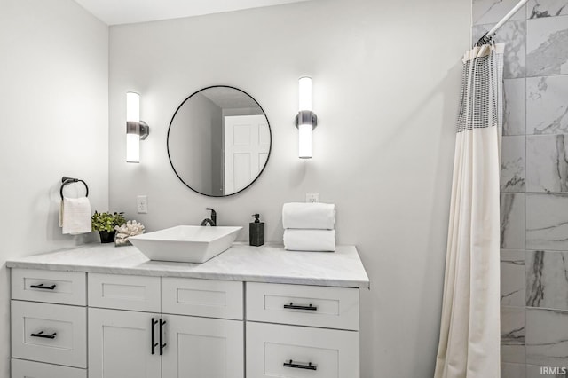 bathroom with vanity and curtained shower