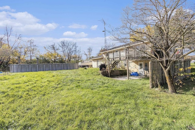 view of yard featuring a wooden deck