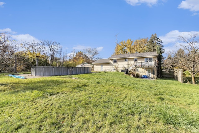 view of yard with a trampoline