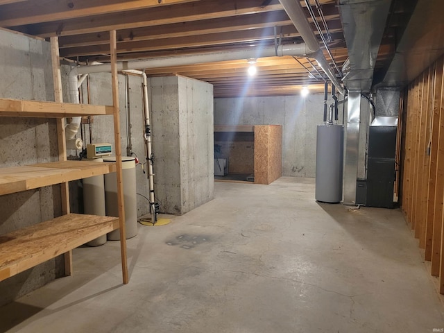 basement with heating unit and water heater