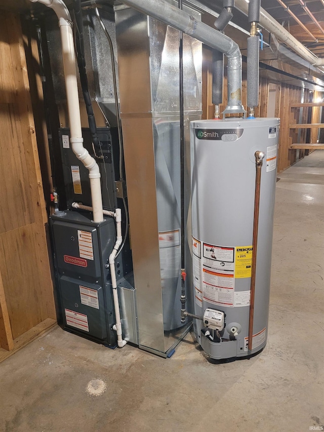 utility room featuring gas water heater