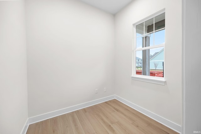 empty room featuring hardwood / wood-style flooring