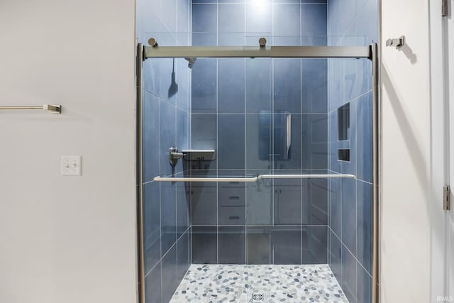 bathroom with an enclosed shower