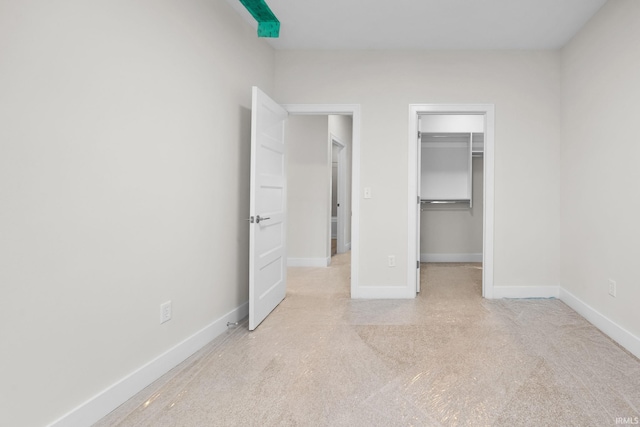 unfurnished bedroom featuring a closet