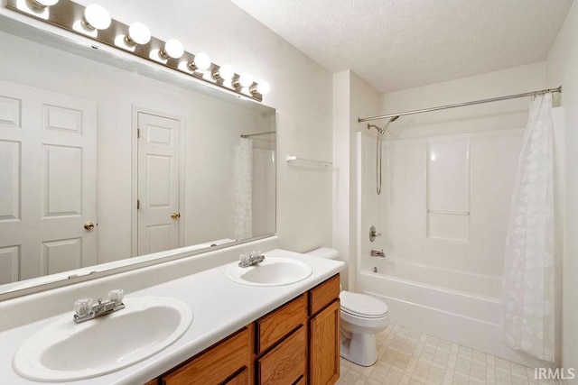 full bathroom featuring vanity, toilet, shower / bathtub combination with curtain, and a textured ceiling