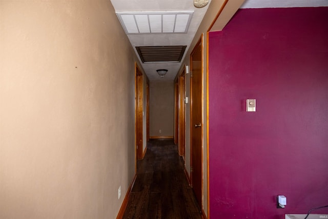 corridor with dark wood-type flooring