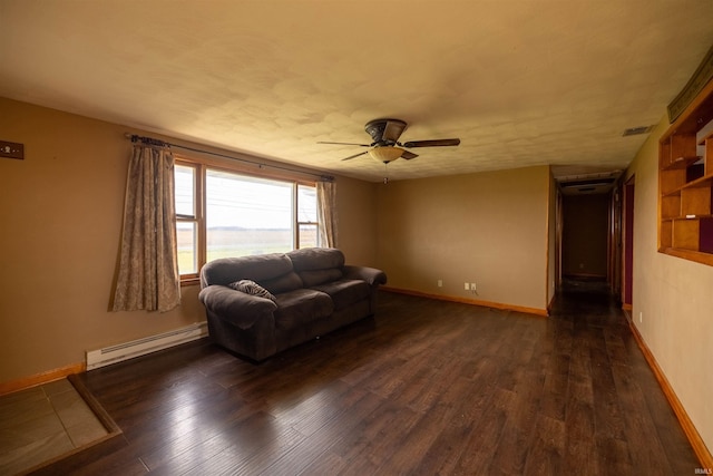 living room featuring baseboard heating, ceiling fan, and dark hardwood / wood-style floors