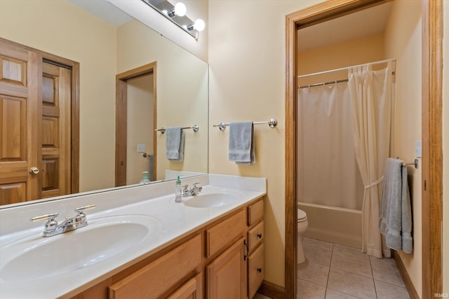 full bathroom with tile patterned floors, vanity, toilet, and shower / tub combo with curtain