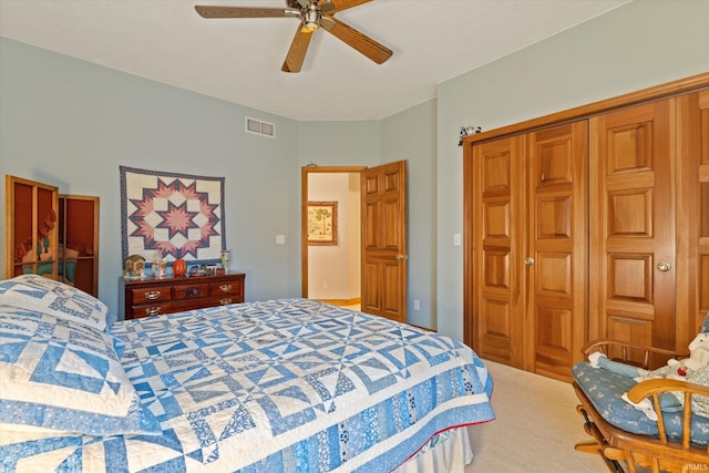 carpeted bedroom featuring ceiling fan