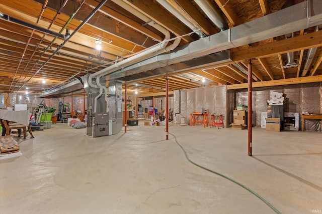 basement featuring heating unit