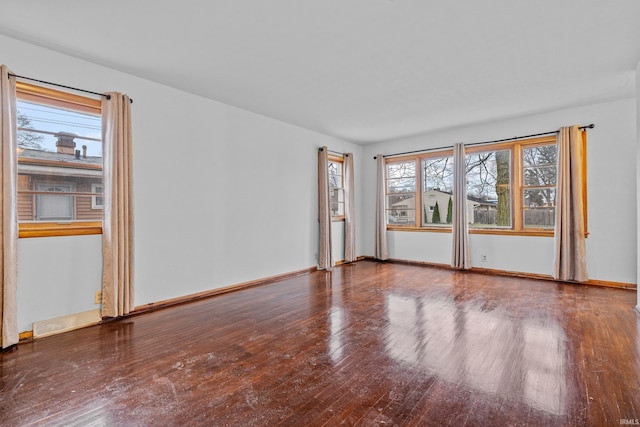 empty room featuring hardwood / wood-style flooring