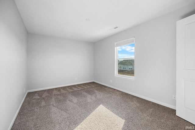 view of carpeted spare room