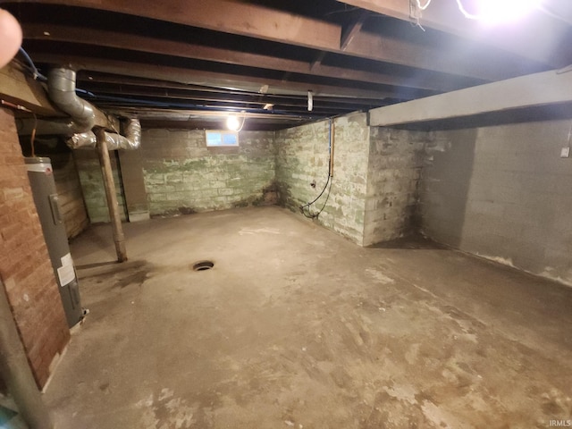 basement featuring water heater