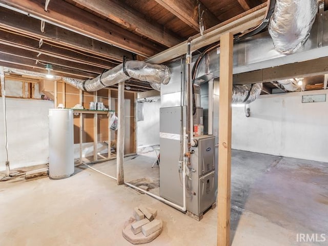 basement with heating unit and water heater