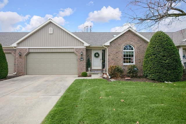 ranch-style home with a garage and a front lawn