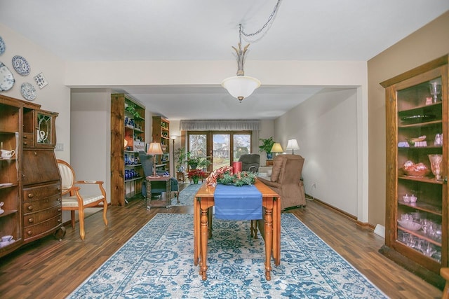 dining room with dark wood-type flooring