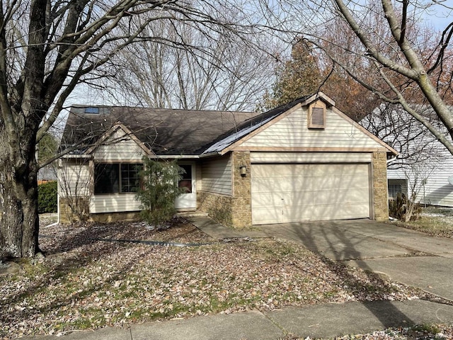 ranch-style home featuring a garage