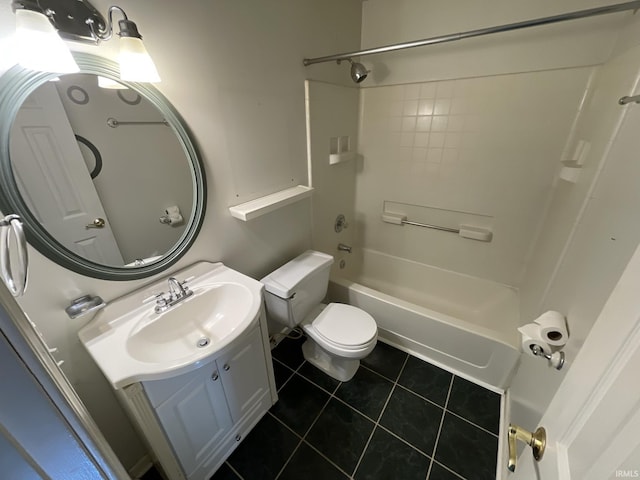 full bathroom featuring tile patterned flooring, vanity, tiled shower / bath combo, and toilet