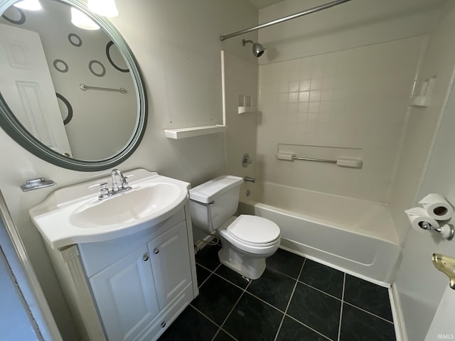 full bathroom with tile patterned flooring, vanity, toilet, and tiled shower / bath