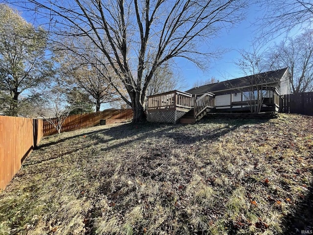 view of yard featuring a wooden deck