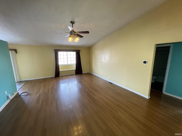 unfurnished room with a textured ceiling, ceiling fan, and dark hardwood / wood-style floors