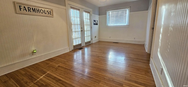 interior space featuring hardwood / wood-style floors and french doors