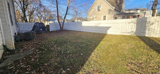 view of yard featuring central AC unit