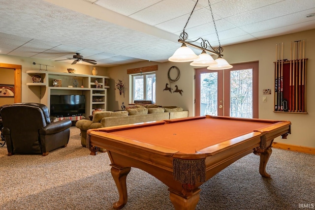 recreation room featuring carpet, french doors, ceiling fan, and billiards