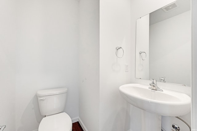 4528 Timber Creek Pkwy, New Haven, IN 46774 - bathroom with wood-type flooring, toilet, and sink