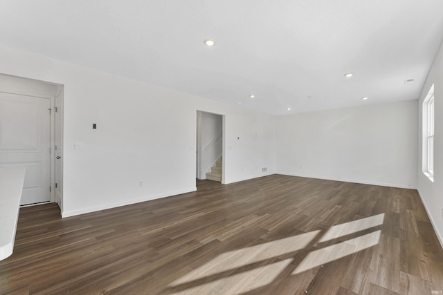 4528 Timber Creek Pkwy, New Haven, IN 46774 - unfurnished living room with dark hardwood / wood-style floors