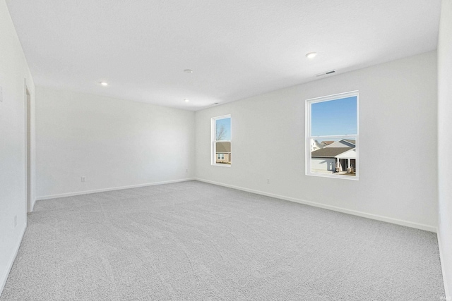 4528 Timber Creek Pkwy, New Haven, IN 46774 - empty room featuring light carpet and a healthy amount of sunlight
