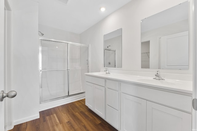 4528 Timber Creek Pkwy, New Haven, IN 46774 - bathroom with hardwood / wood-style floors, vanity, and a shower with door