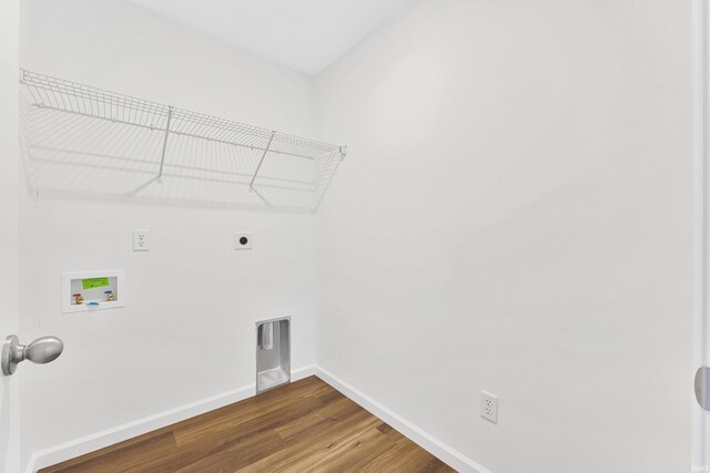 4528 Timber Creek Pkwy, New Haven, IN 46774 - laundry room with hookup for an electric dryer, washer hookup, and hardwood / wood-style flooring