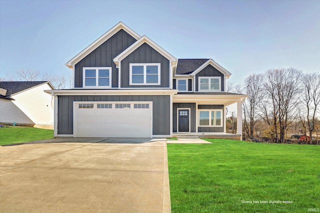 view of front facade featuring a front lawn and a garage