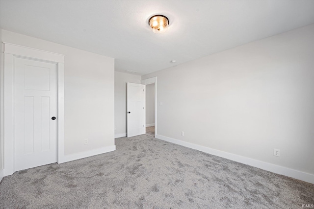 unfurnished bedroom with carpet floors