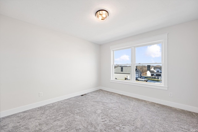 unfurnished room with carpet