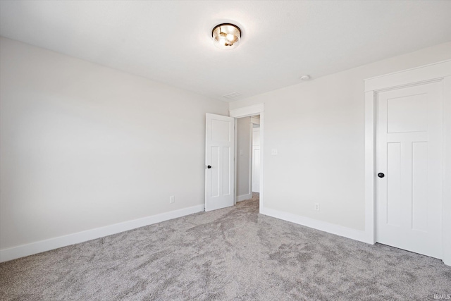 unfurnished room with carpet floors