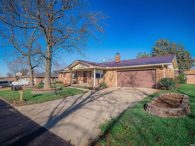 ranch-style house with a garage and a front lawn