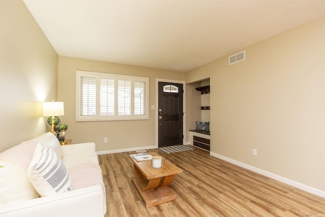 living room with hardwood / wood-style flooring