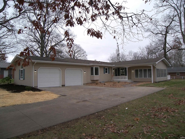 ranch-style house featuring a garage