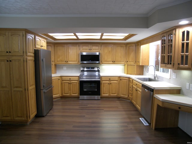 kitchen with dark hardwood / wood-style floors, sink, stainless steel appliances, and crown molding