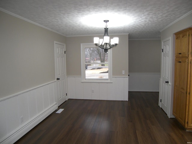 unfurnished dining area featuring a baseboard heating unit, ornamental molding, a textured ceiling, dark hardwood / wood-style flooring, and a chandelier