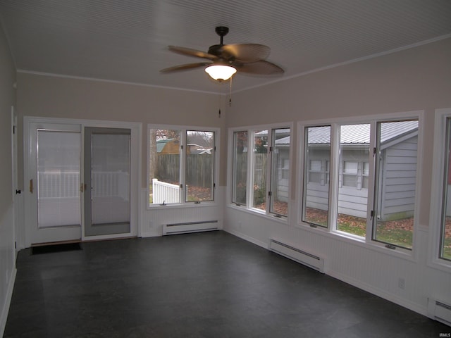 unfurnished sunroom featuring baseboard heating and ceiling fan