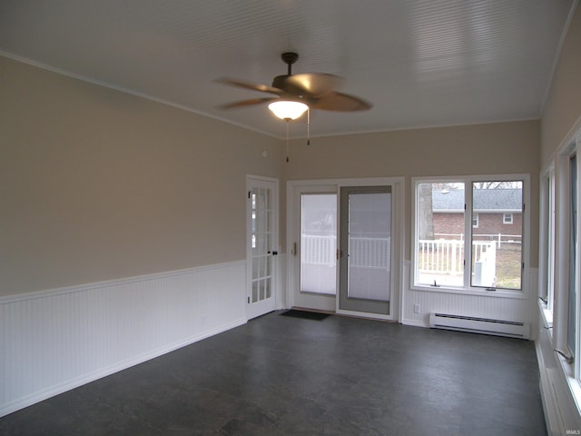 spare room with french doors, a baseboard radiator, ceiling fan, and ornamental molding