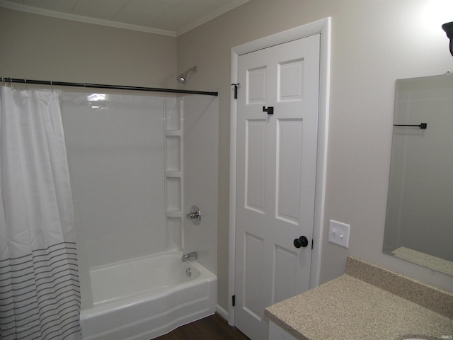 bathroom featuring wood-type flooring, vanity, crown molding, and shower / bath combination with curtain